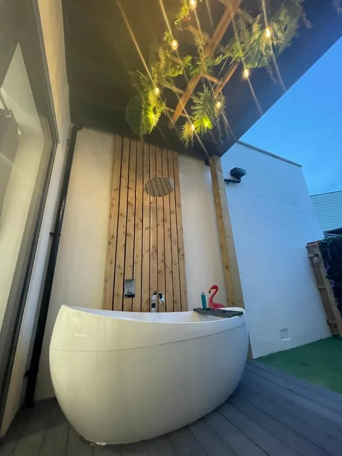 Coastline Retreats: Jungle-Themed Seafront Garden Apartment Bournemouth