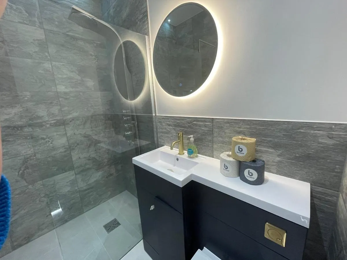 Coastline Retreats: Jungle-Themed Seafront Garden Apartment Bournemouth